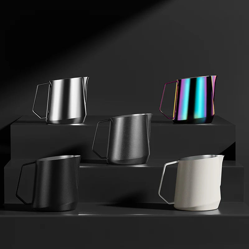 MHW-3BOMBER GT Milk Pitchers in silver, black, and rainbow finish. Latte art tools with U-shaped spout and diamond handle.