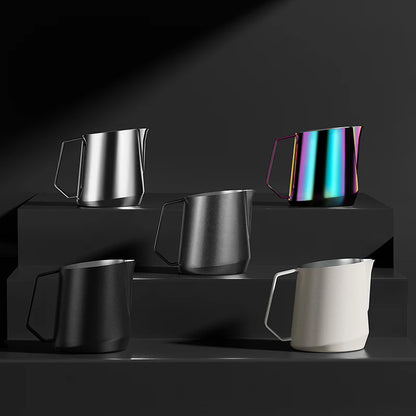 MHW-3BOMBER GT Milk Pitchers in silver, black, and rainbow finish. Latte art tools with U-shaped spout and diamond handle.