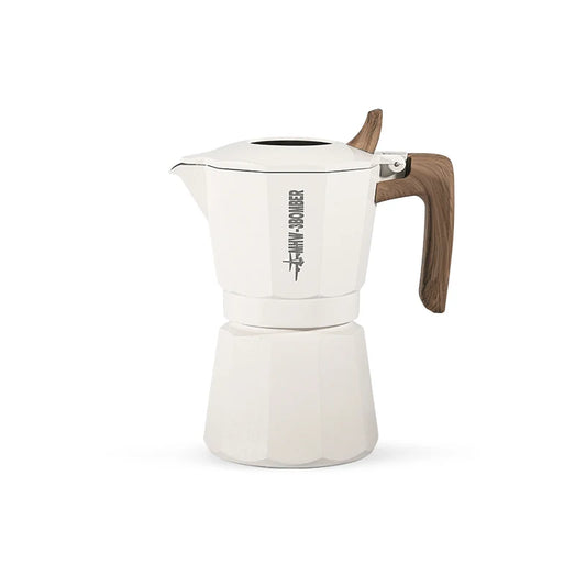 The MHW-3BOMBER Double Valve Moka Pot 100ml features a white design with a wooden handle and knob, set against a plain white backdrop. The brand logo enhances its modern look, ideal for craft coffee lovers. Its also compatible with various stovetops.