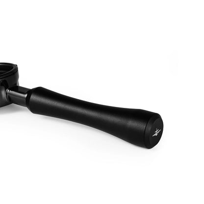 MHW-3BOMBER black portafilter with bottomless design and branded handle. Close-up shot.