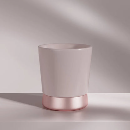 MHW-3BOMBER pink ceramic CERA coffee cup with metallic pink base. Modern color-blocking design. 