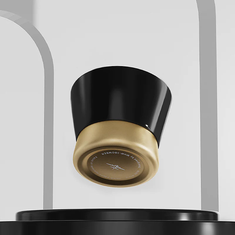 MHW-3BOMBER CERA ceramic cup, black with gold base. Modern design coffee cup.