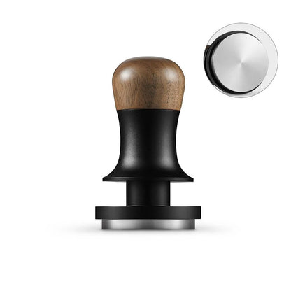 The MHW-3BOMBER Flash Tamper features an ergonomic wooden handle, black midsection, and stainless steel base. It is displayed upright with a top view of its flat metal base.