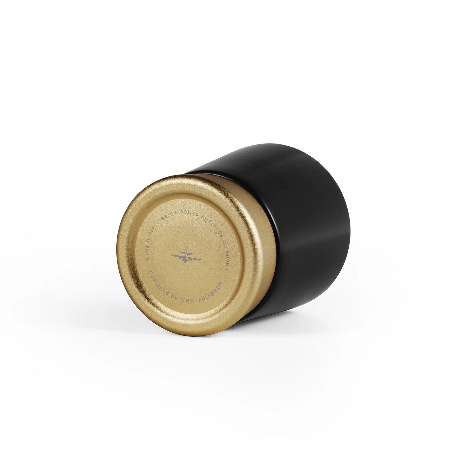 MHW-3BOMBER CERA black ceramic cup with gold base. Stylish coffee cup, viewed from the bottom.