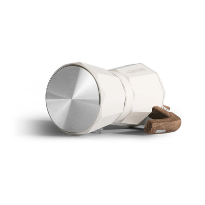 A sleek, modern speaker with a white and silver finish and wooden handle. Its angled, faceted exterior and circular metallic front offer style and durability.