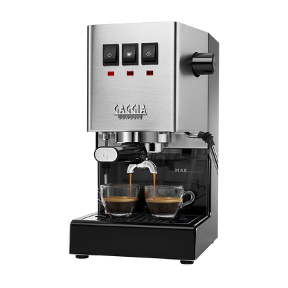 A sleek Gaggia Classic Evo espresso machine in stainless steel finish, featuring a minimalist design with a commercial-style 58mm portafilter, a professional steam wand for frothing milk, and a brushed metal exterior. The front panel displays simple, tactile switches for power and brewing control, along with a sturdy drip tray at the base. The machine’s robust, polished appearance reflects its premium build quality, ideal for home baristas looking for a durable and elegant addition to their kitchen.