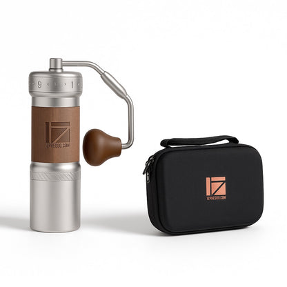 1Zpresso K-Ultra manual coffee grinder with case. Silver, wood accents, adjustable settings.