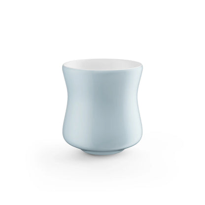 MHW-3BOMBER Aura light blue ceramic cup with a curved design. 